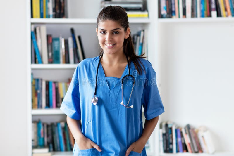 Beautiful young adult spanish female nurse or medical student