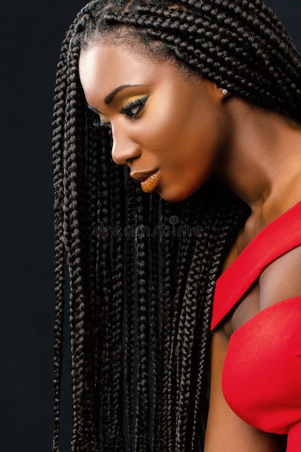 Beautiful young african woman with long braided hair. stock photos Beautiful young african woman with long braided hair. stock photos