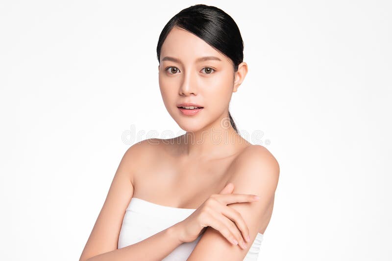 Beautiful young asian woman with clean fresh skin on white background, Face care, Facial treatment, Cosmetology, beauty and spa