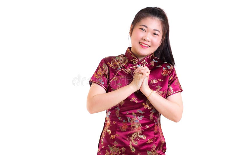 Beautiful Young asian woman wear chinese dress traditional cheongsam or qipao. With gesture of congratulation, stock photo Beautiful Young asian woman wear chinese dress traditional cheongsam or qipao. With gesture of congratulation, stock photo