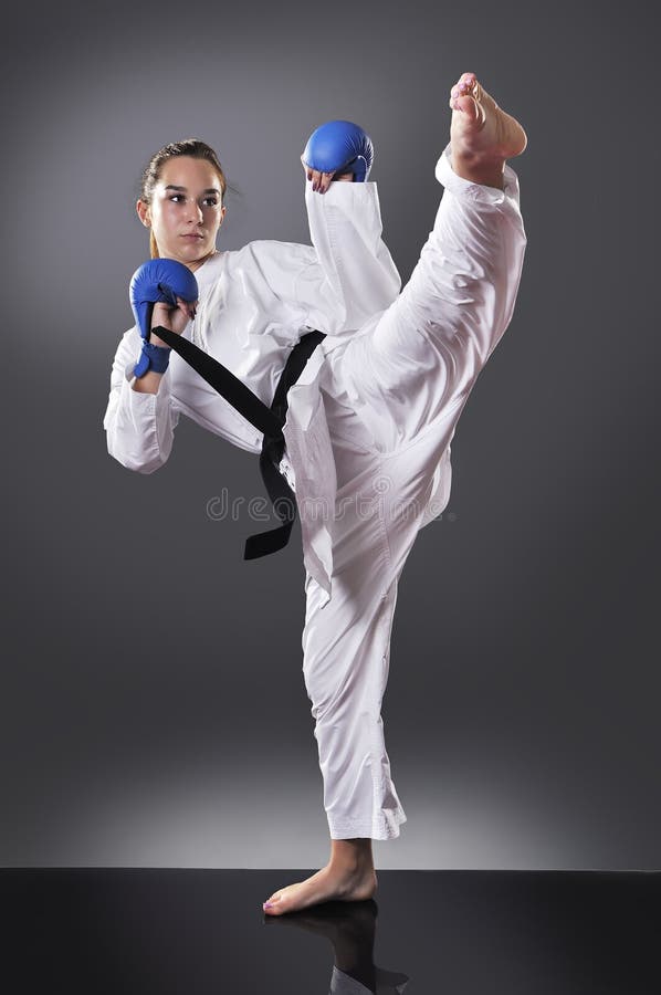 Beautiful Young Black Belt Female Karate Doing Kick Stock Photos Free