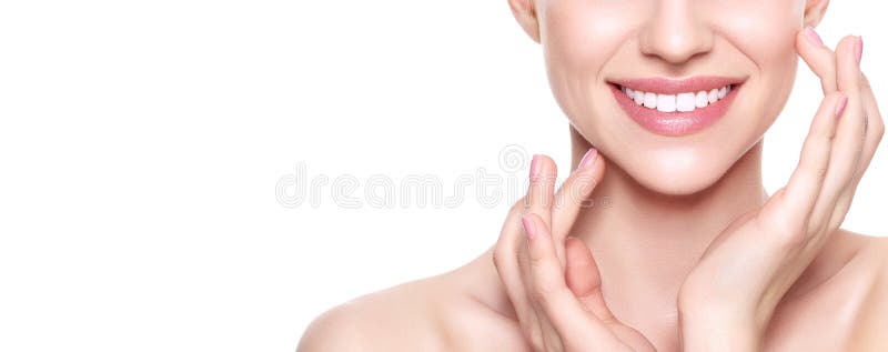 Beautiful Young Blond Woman with Perfect Skin touching her face. Facial treatment. Cosmetology, beauty and spa concept. royalty free stock images Beautiful Young Blond Woman with Perfect Skin touching her face. Facial treatment. Cosmetology, beauty and spa concept. royalty free stock images