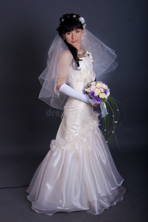 Beautiful young bride with long black hair