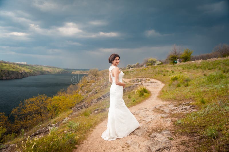 Beautiful young bride in luxury wedding dress