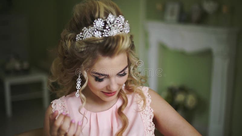 Beautiful Young Bride. Stylish Woman Fiancee with Bridal Hairstyle, Event Makeup and Jewelry