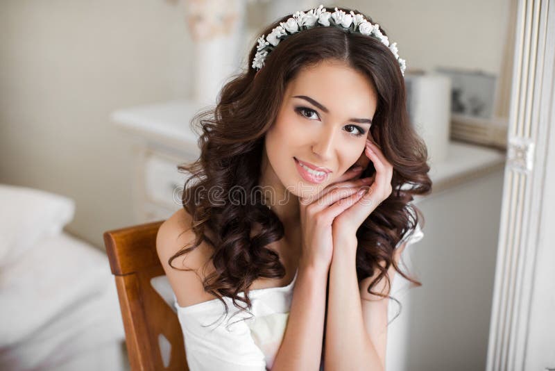 Beautiful young bride wedding makeup and hairstyle