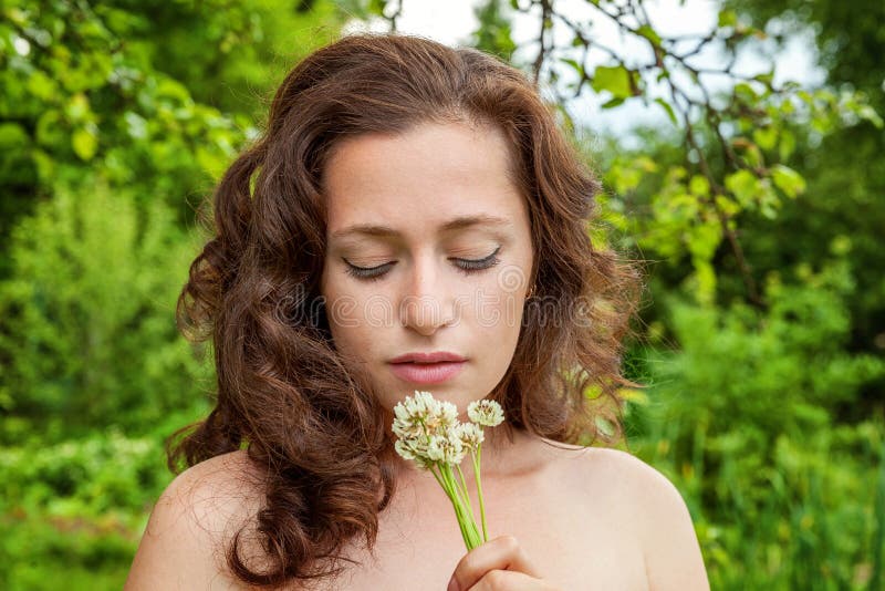 Girl With The Flowers In Her Hand In A Park Stock Image Image Of