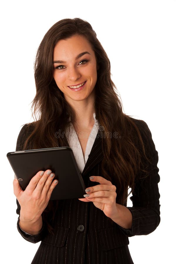 beautiful young business woman looking at tablet gesturing success isolated over white background