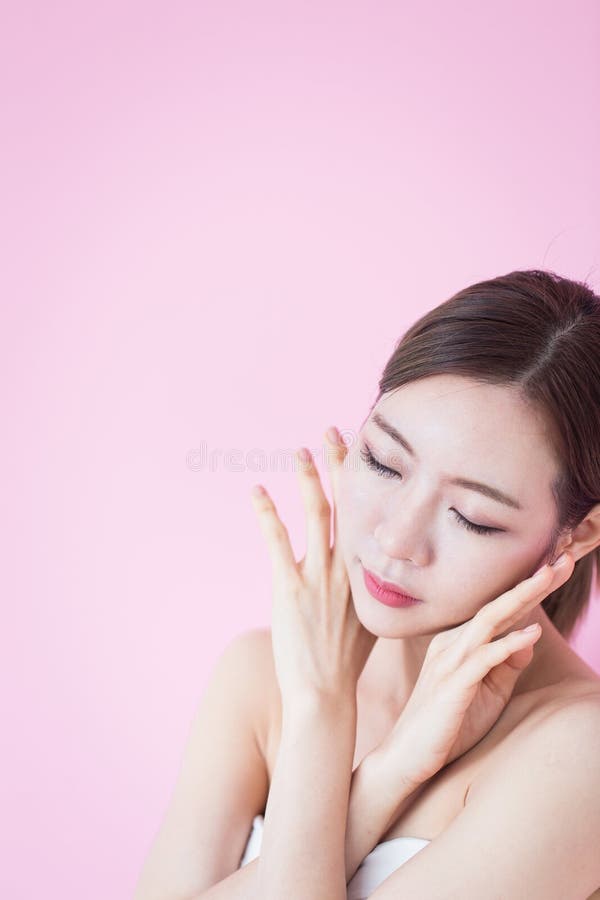Beautiful young caucasian asian woman smile with clean fresh skin face natural makeup. cosmetology, skincare, cleaning face, stock photography Beautiful young caucasian asian woman smile with clean fresh skin face natural makeup. cosmetology, skincare, cleaning face, stock photography