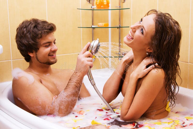 Beautiful young couple enjoying a bath