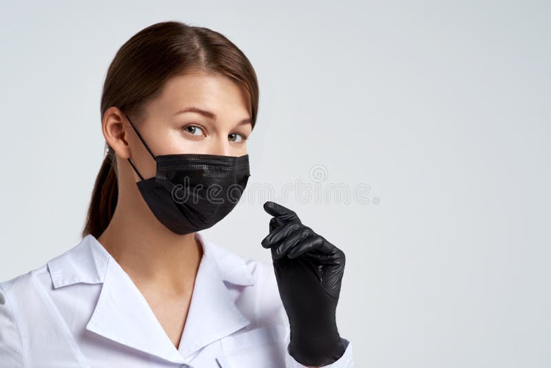 https://thumbs.dreamstime.com/b/beautiful-young-doctor-woman-protective-medical-mask-black-gloves-smiling-eyes-studio-portrait-background-114477920.jpg