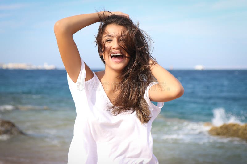 Beautiful young girl face portrait, brown hair and nice smile, fashion model look royalty free stock photography Beautiful young girl face portrait, brown hair and nice smile, fashion model look royalty free stock photography