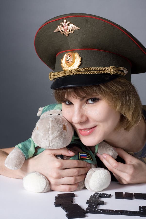 Beautiful young girl in form of Russian army