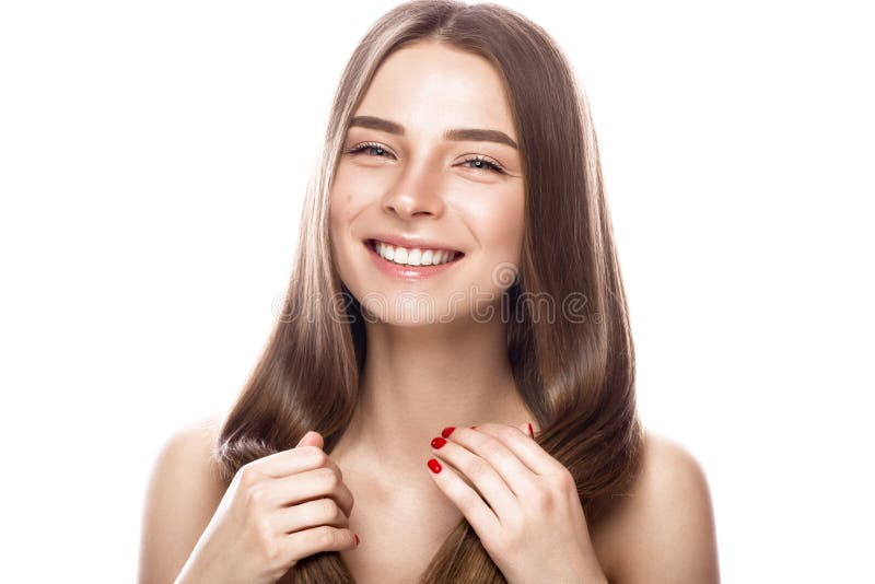 Beautiful young girl with a light natural make-up and perfect skin. Beauty face. royalty free stock image Beautiful young girl with a light natural make-up and perfect skin. Beauty face. royalty free stock image