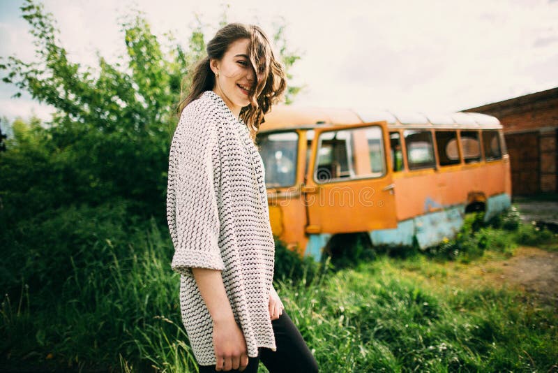 Beautiful young girl poses near retro car stock image Beautiful young girl poses near retro car stock image