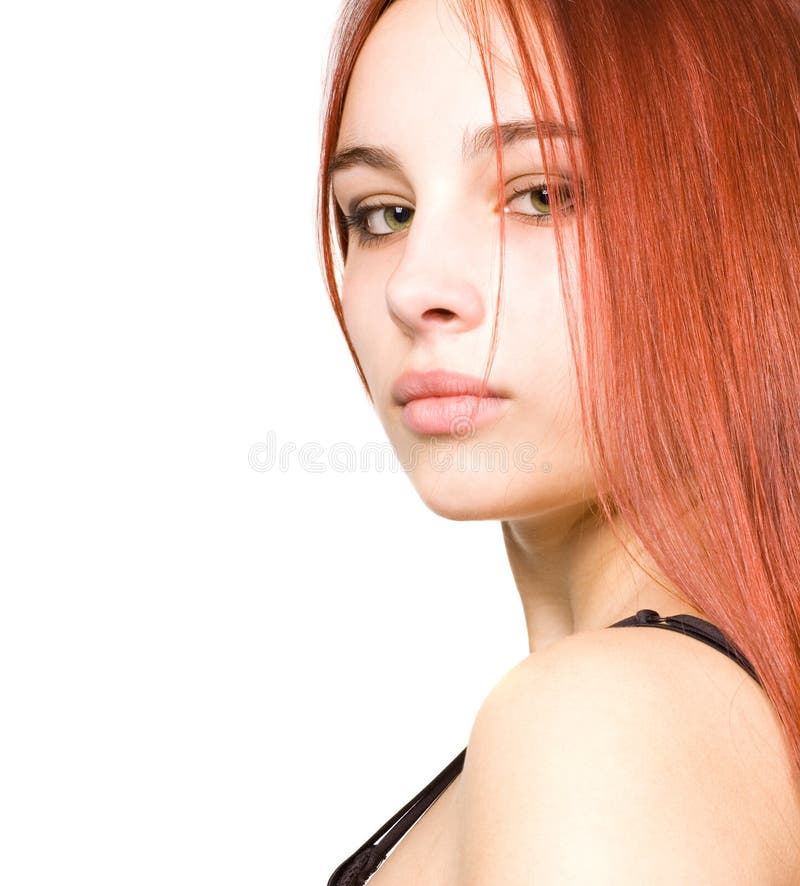 Beautiful young girl with red hair and green eyes