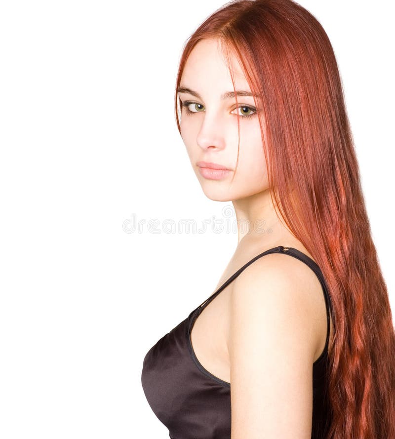 Beautiful young girl with red hair and green eyes