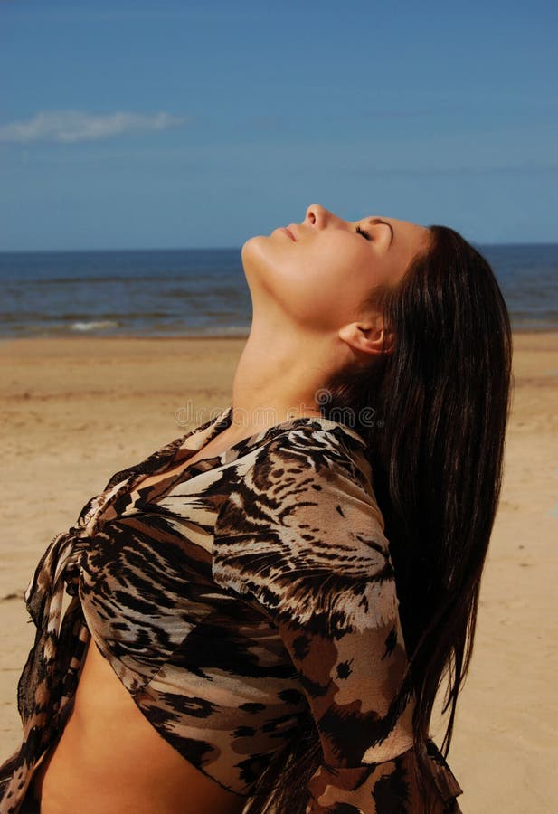 Beautiful young girl sunbathing