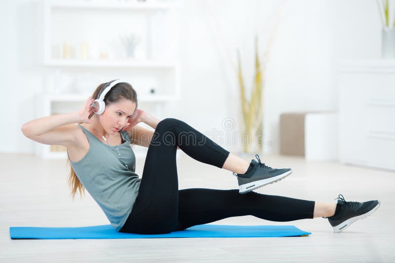 Beautiful young girl in on training mat stock photo