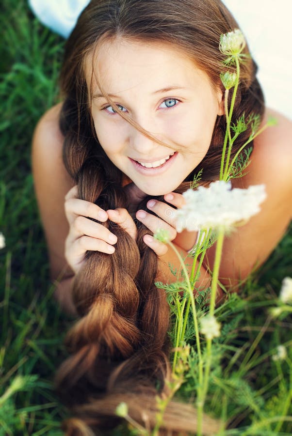 Beautiful Young Girl with Very Long Hair Outdo