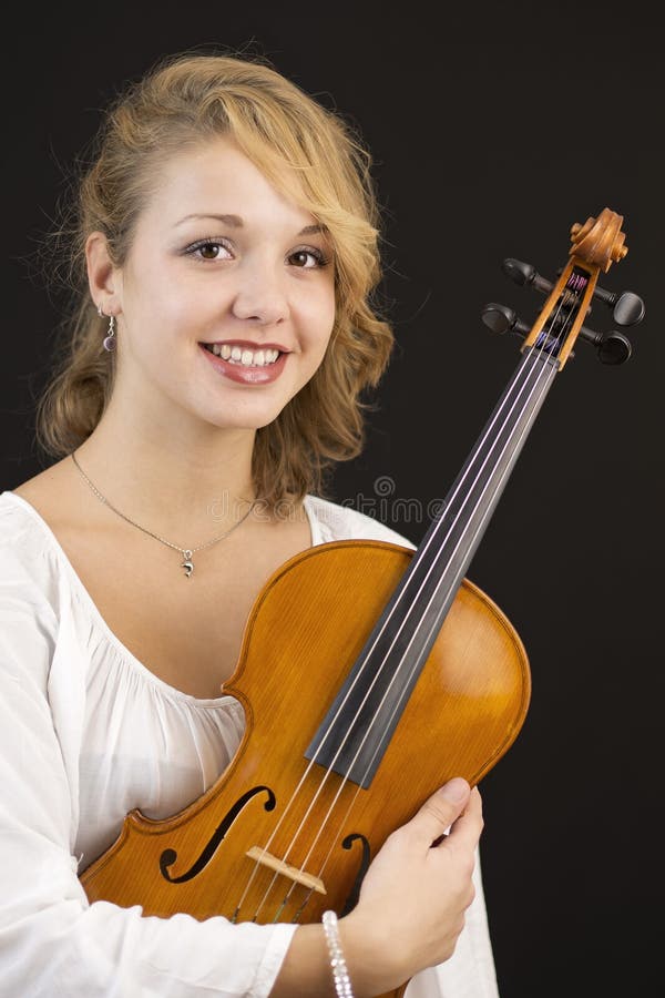 Beautiful young girl with viola stock photos