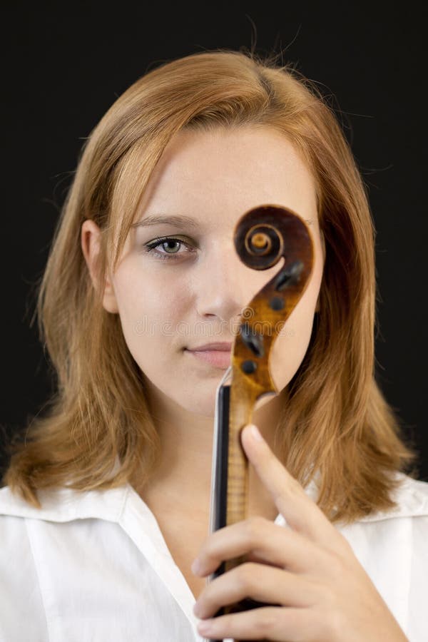 Beautiful young girl with violin royalty free stock photos