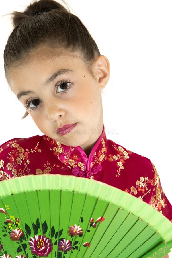 Beautiful Young Girl Wearing a Chinese Dress Holding a Fan Stock Photo ...