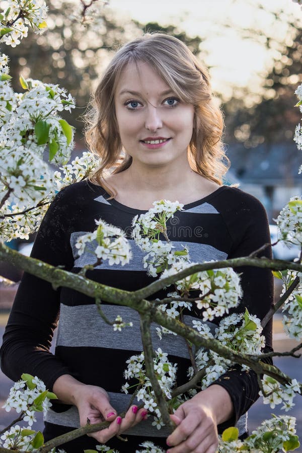 https://thumbs.dreamstime.com/b/beautiful-young-happy-woman-portrait-smiling-caucasian-near-blooming-spring-flowers-51169576.jpg