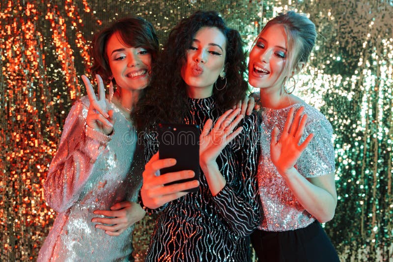 Beautiful Young Happy Women Friends Posing Over Glitter Wall Background ...