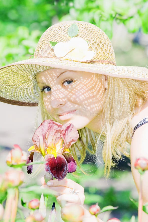 Beautiful young lady in the garden