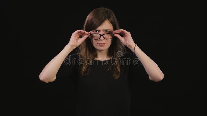 A Lady Mimicing Against a Black Background