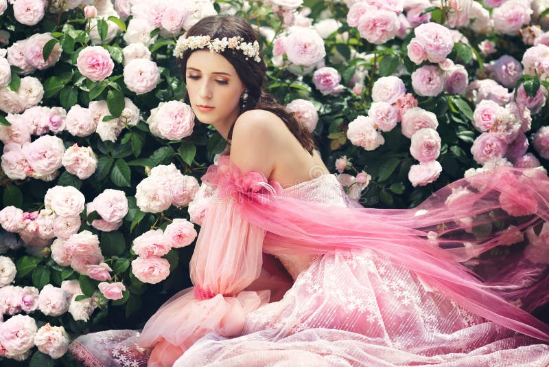 Princess in a Magic Rose Garden Stock Photo - Image of blooming, dress ...