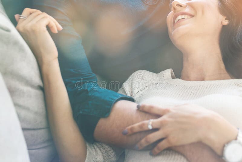 Beautiful young woman hugging with a man. stock photos