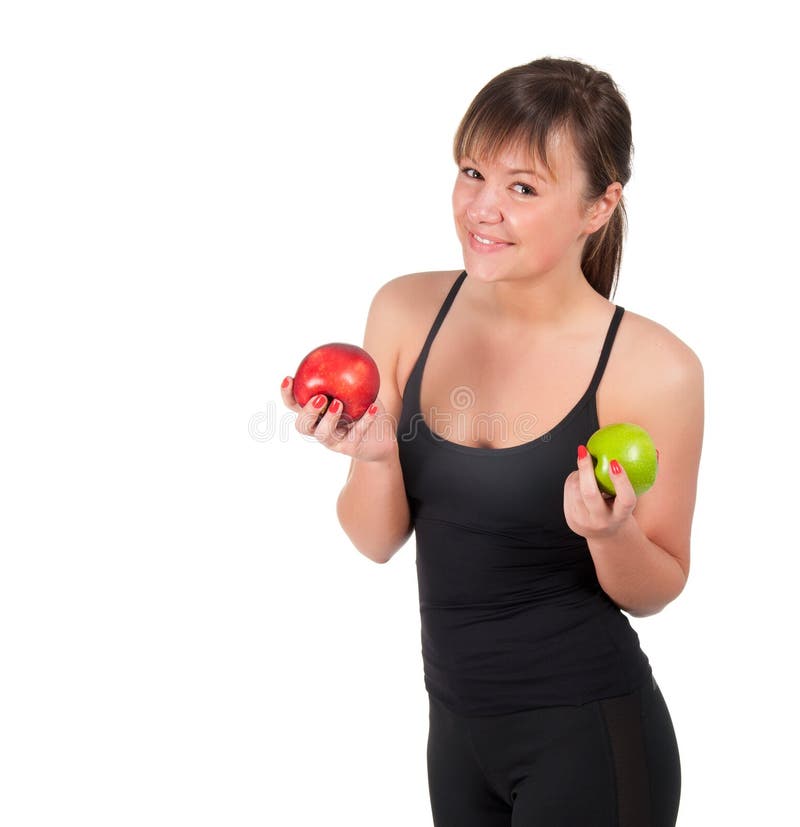 Beautiful young sport woman with red and green apple, isolated on white royalty free stock images Beautiful young sport woman with red and green apple, isolated on white royalty free stock images
