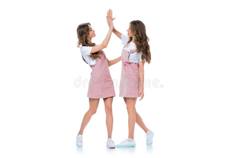 Beautiful Young Twins Giving High Five Stock Image Image of shirts