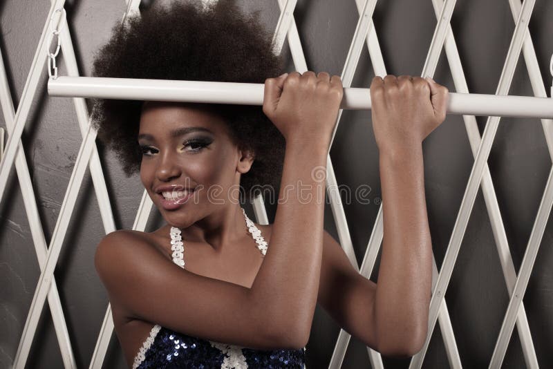Beautiful young woman with an afro