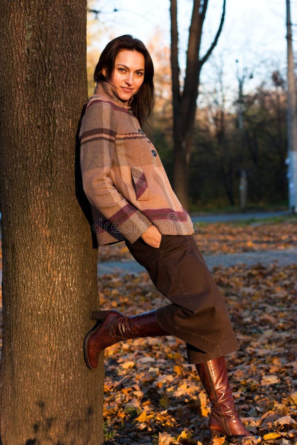 Beautiful young woman in autumn