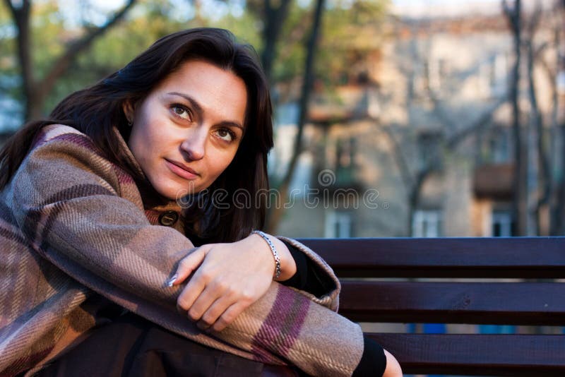 Beautiful young woman in autumn