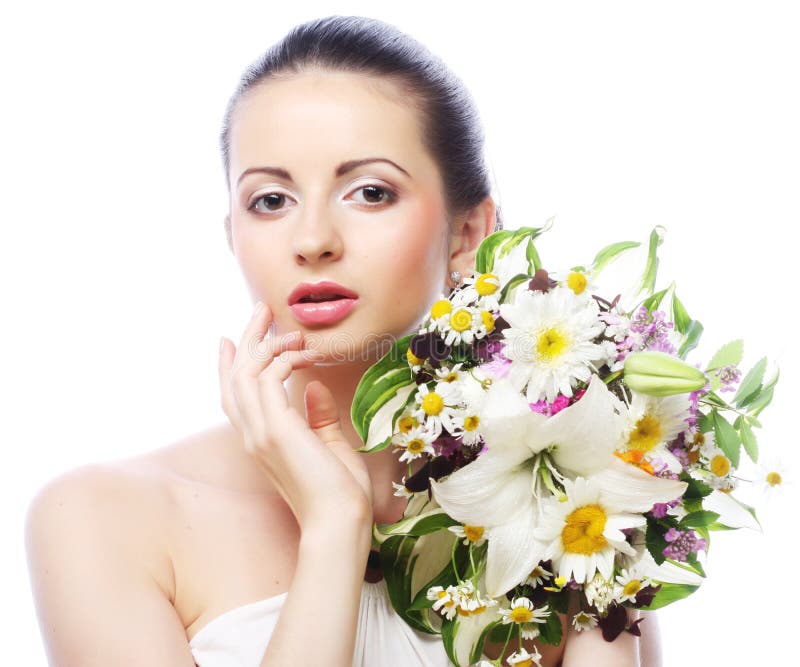 Beautiful young woman with bouquet flowers