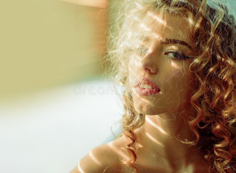 Curly blonde sensual maid