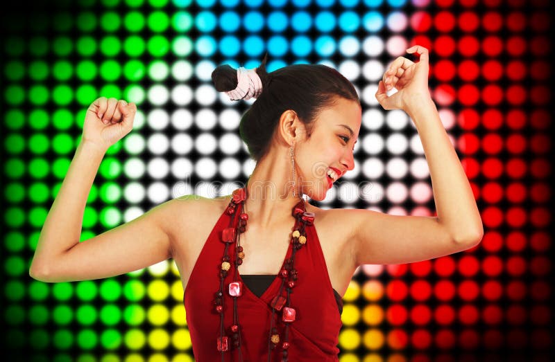 Beautiful Young Woman Dancing At A Club