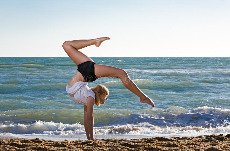 Beautiful young woman doing fitness exercise