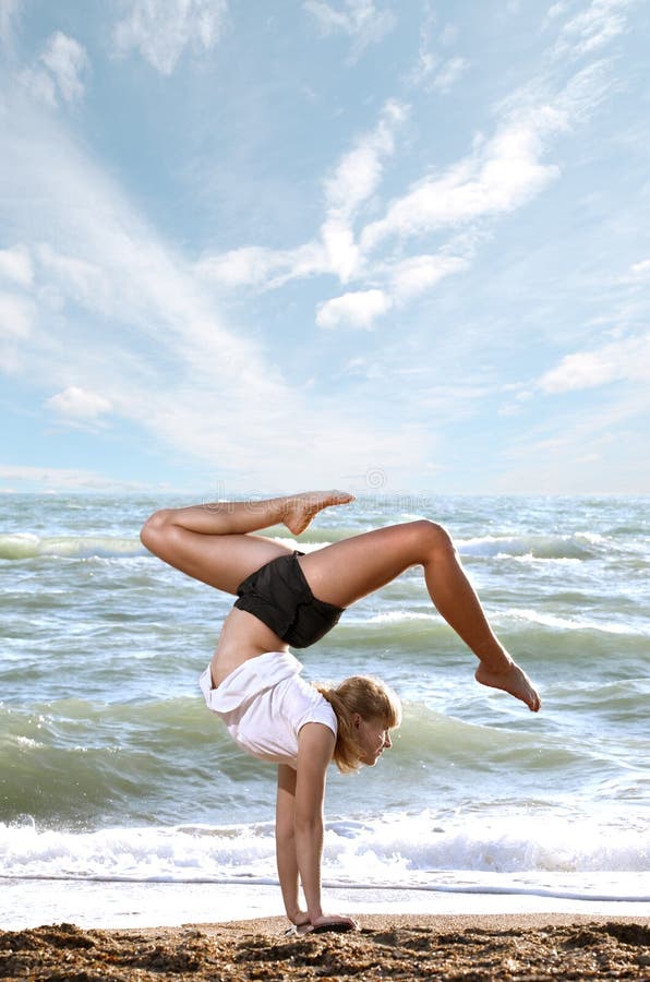 Beautiful young woman doing fitness exercise