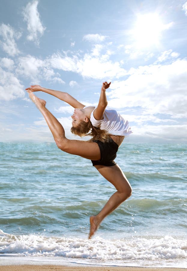 Beautiful young woman doing fitness exercise