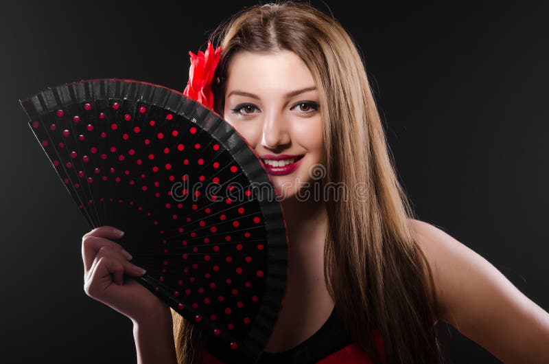 Beautiful young woman with flower