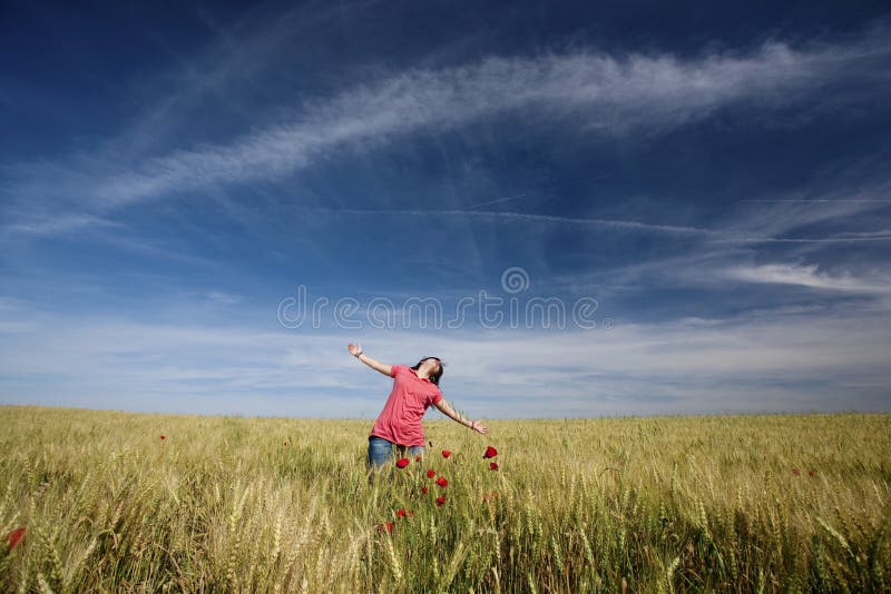 Beautiful young woman happy in the nature