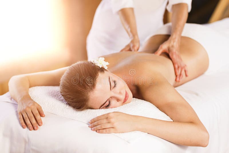Beautiful young woman has massage