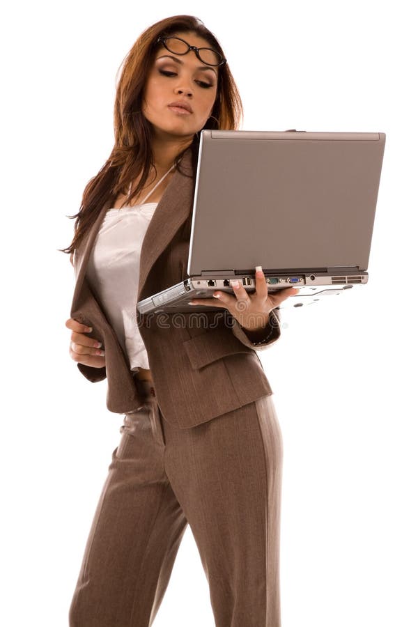 Beautiful young woman holding laptop royalty free stock images
