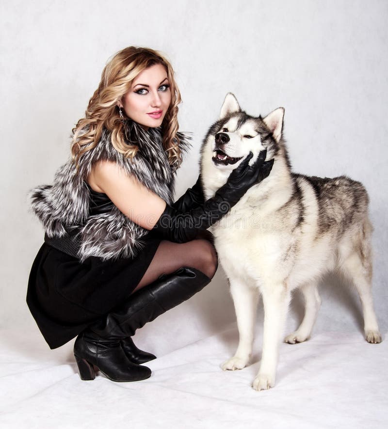 Beautiful Young Woman with a Husky Dog Stock Photo - Image of happiness
