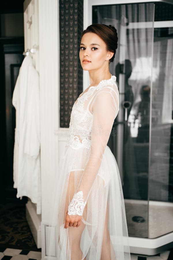 A Beautiful Young Woman in a Lace Robe at the Bathroom Door Stock Image -  Image of leisure, interior: 229451607